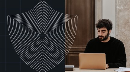 A man works on a laptop beside a digital shield graphic symbolizing cybersecurity and the importance of output escaping.