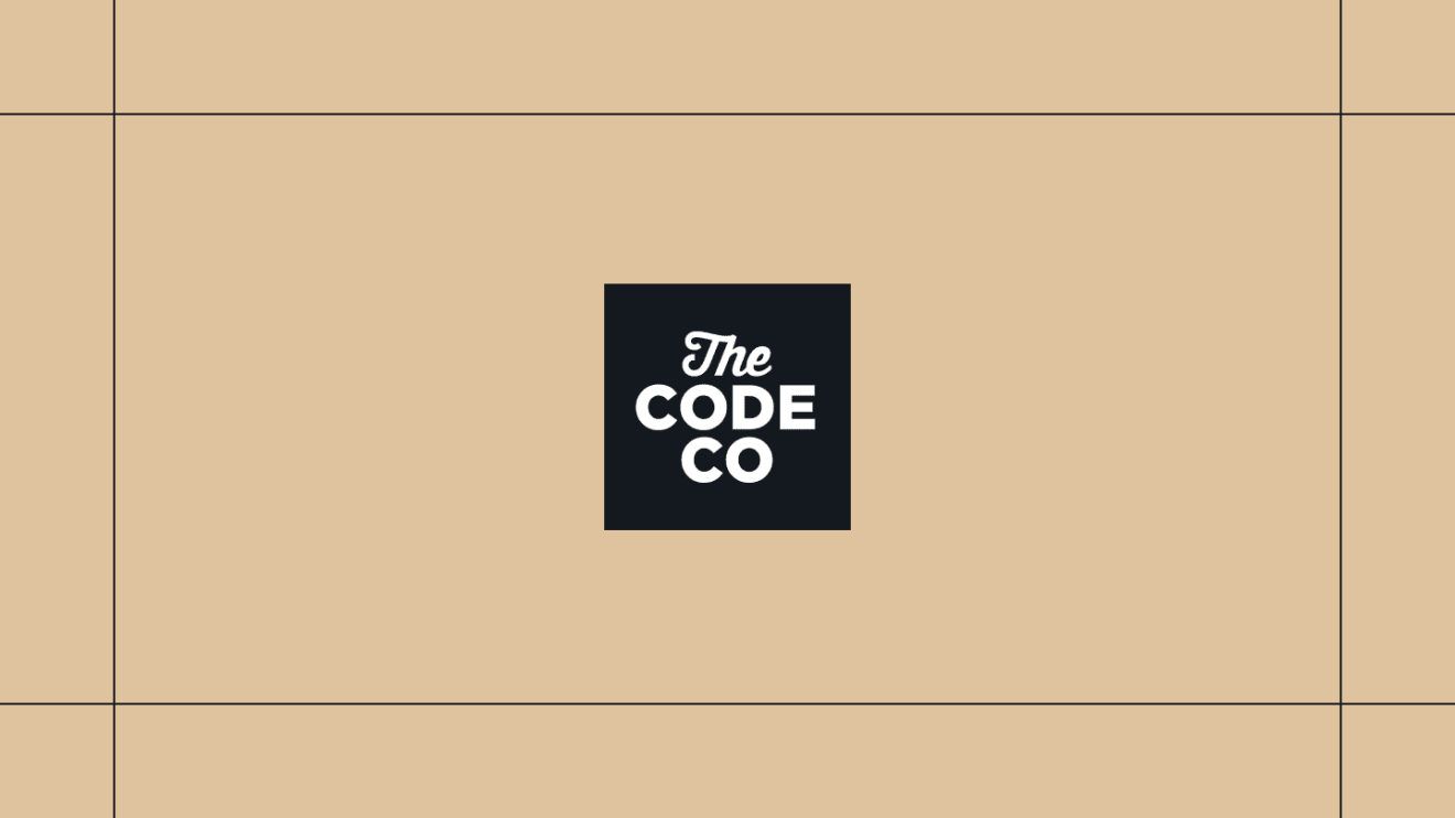 Black The Code Company logo on a gold background, framed by thin black lines.