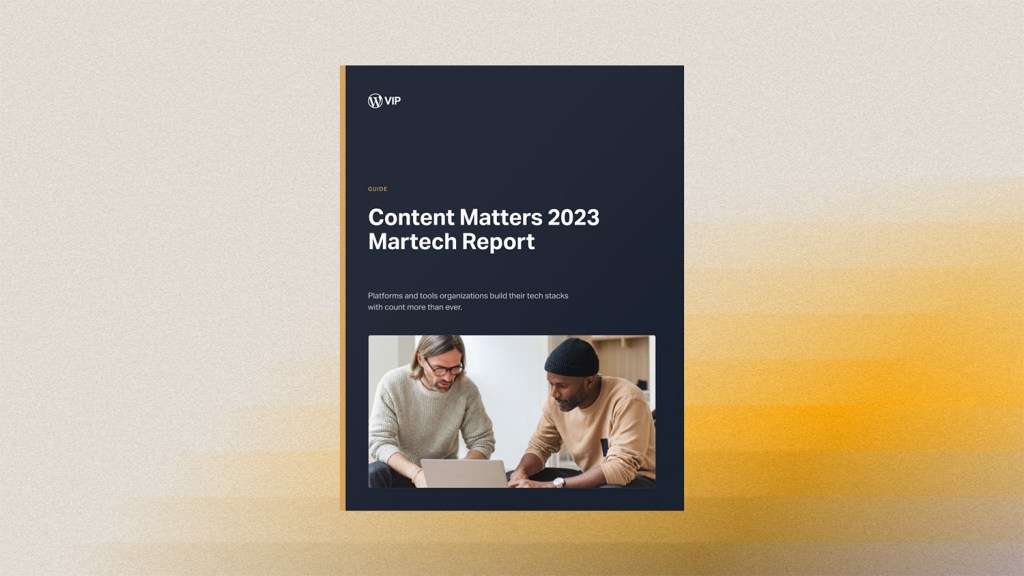 Cover of Content Matters 2023 Martech Report with two people working together on laptops at a table.