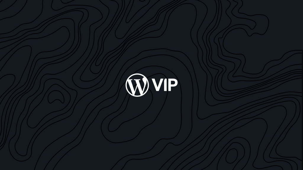 white WordPress VIP logo on black blackground
