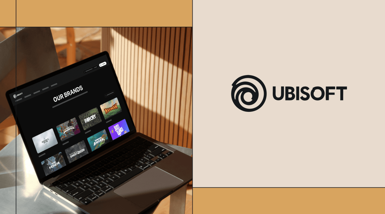 Laptop displaying Ubisoft’s secure intranet with internal brand tiles, alongside the Ubisoft logo, representing global team communication and collaboration.