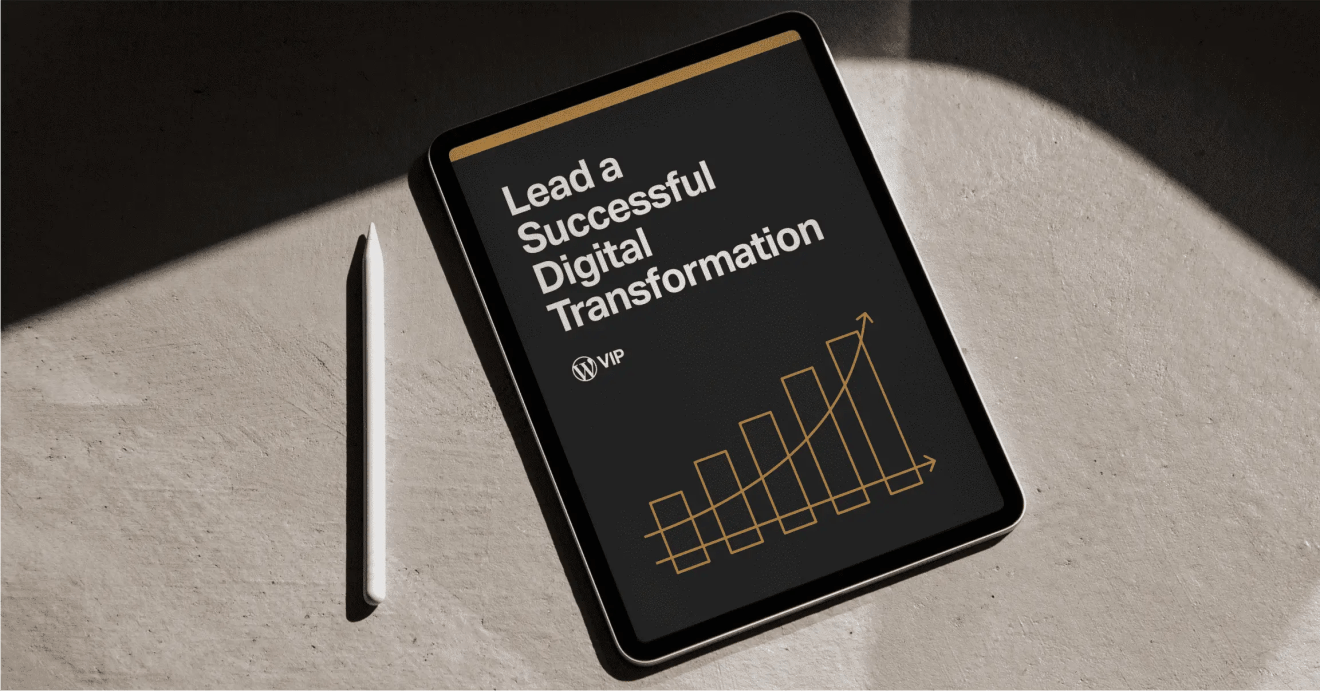 Tablet with stylus displaying digital solution analytics dashboard and gold bar chart for transformation strategy.