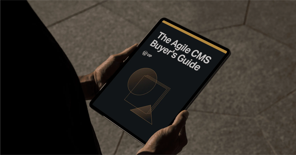 Person holding tablet showing The Agile CMS Buyers Guide digital solution content overview.