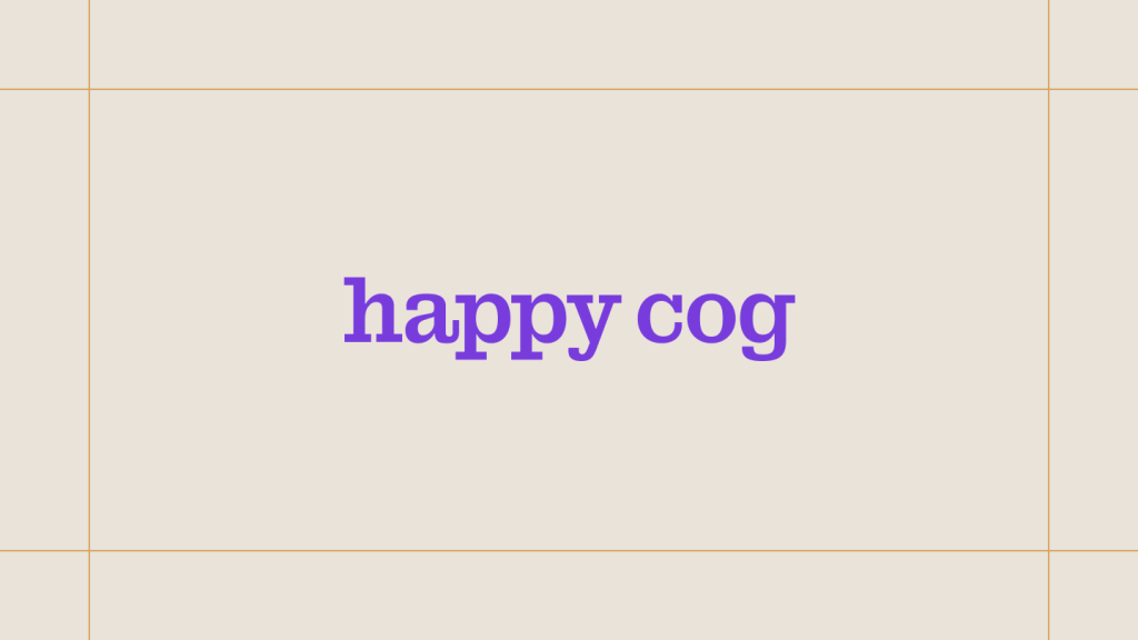 Happy Cog logo on a cream background, framed by thin gold lines.