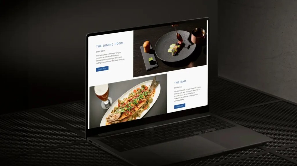 Laptop displaying a restaurant website with food content and descriptions on a digital solution platform.