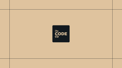 The Code Co. logo on a gold background, framed by thin black lines.