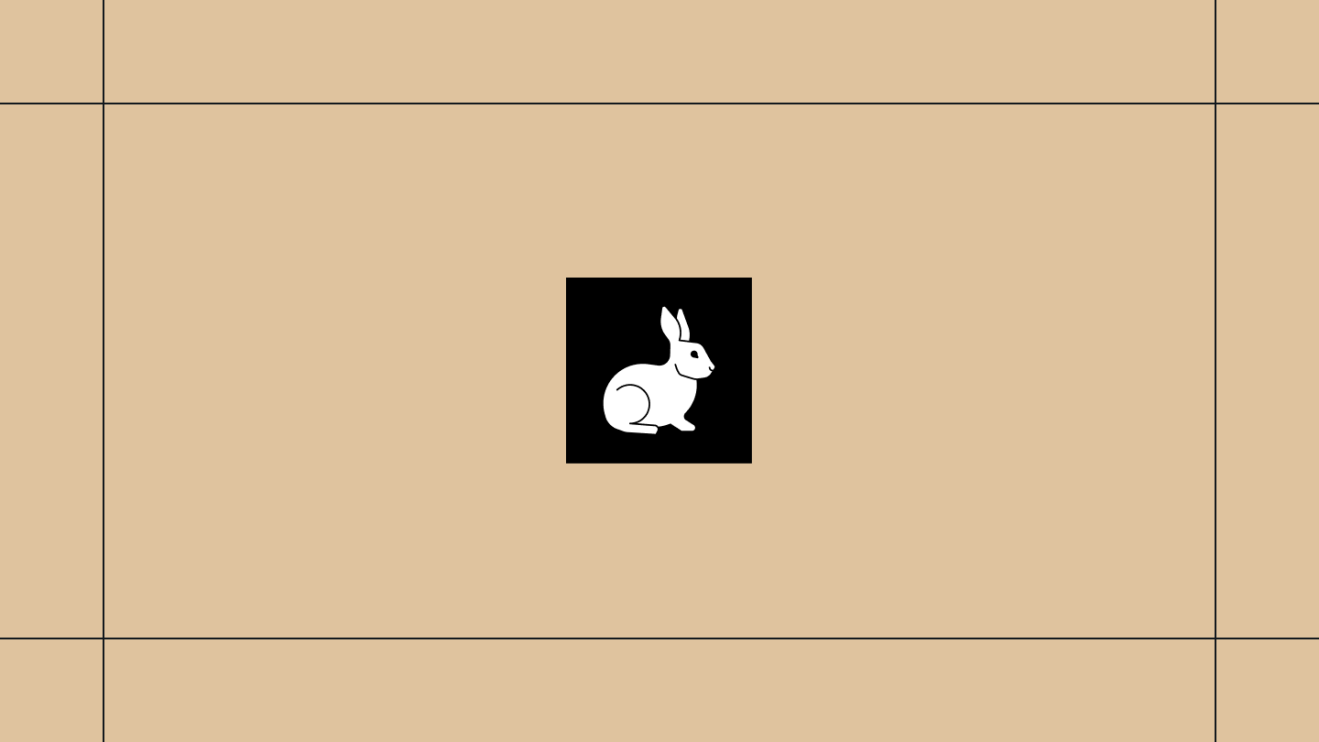White Rabbit logo on a gold background, framed by thin black lines.