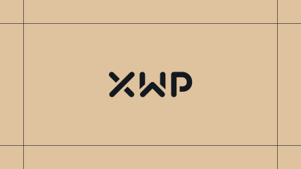 Black XWP logo on a gold background, framed by thin black lines.