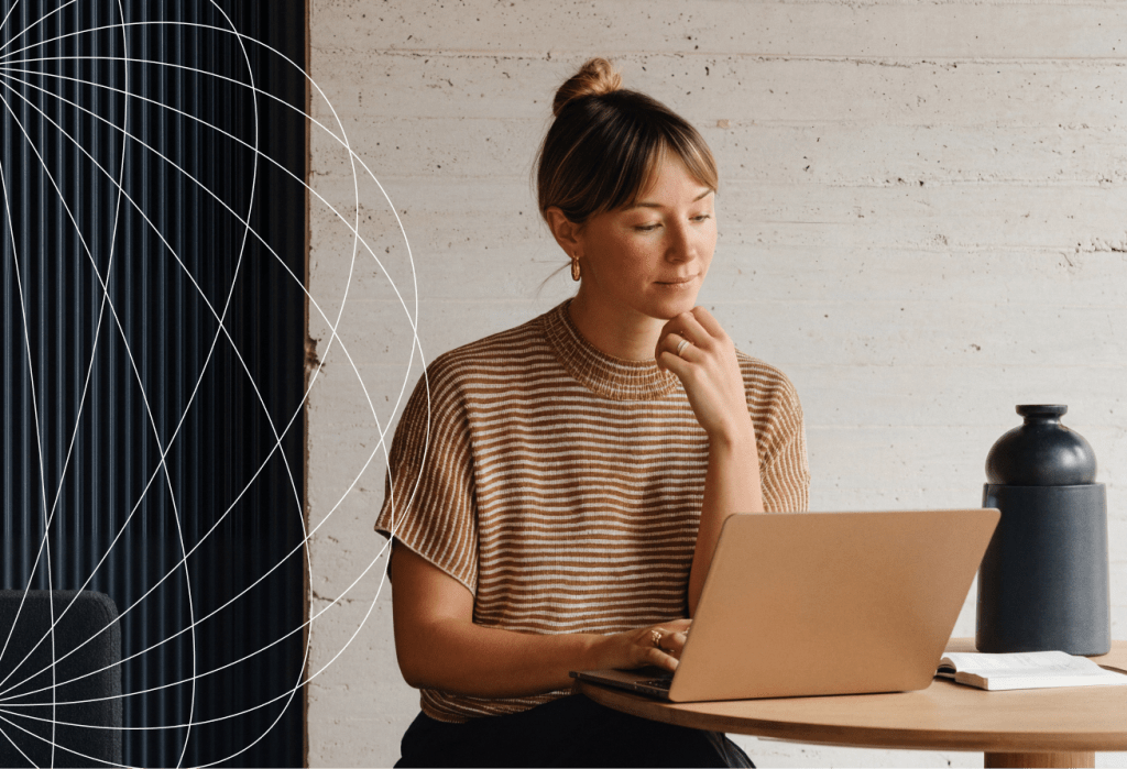 Individual working on a laptop beside a notebook and decorative vase, with an abstract network illustration in the background.
