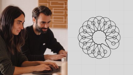 Two people work on laptops beside a geometric circular pattern shown on a light gray background, collaborating on cms localization strategies for streamlined content management.