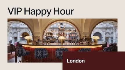 Luxurious bar with ornate arches, plush blue chairs, and golden lighting. Text: WordPress VIP Happy Hour, London—join industry leaders in an exclusive setting during Forrester B2B EMEA.