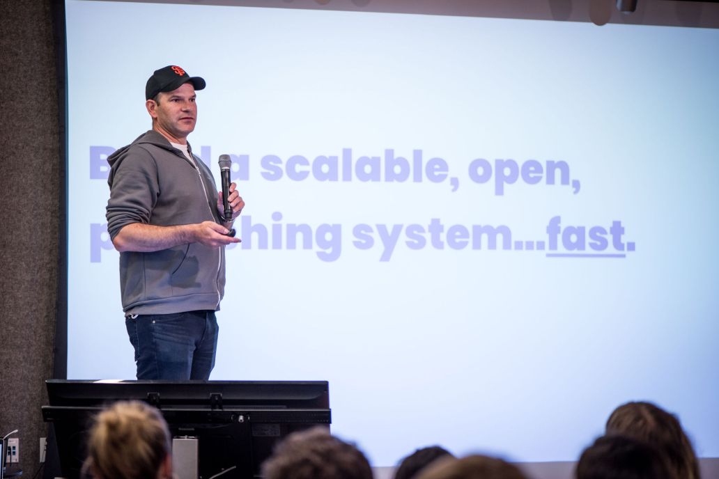 An image of John McAlester presented at BigWP SF on leveraging WordPress for Thrive Global’s massive scale publishing.