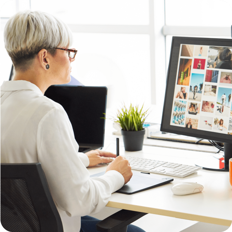 Woman confidently designing her website hosted on WordPress VIP